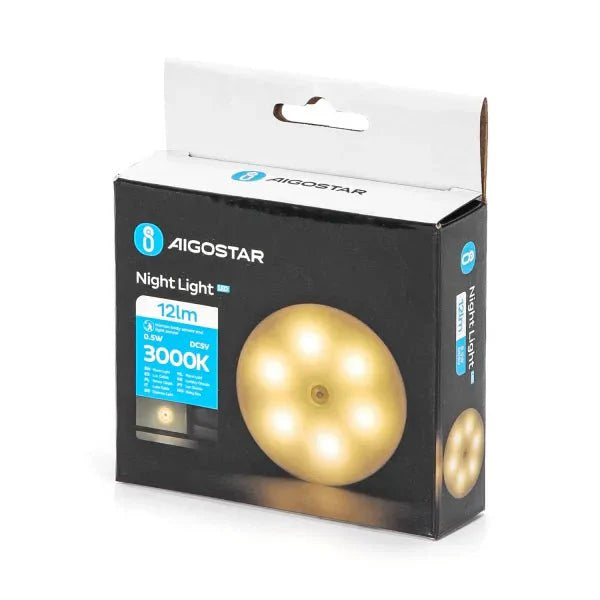 Een witte, ronde bewegingssensor met glazen lens, geschikt voor nachtlicht of veiligheidssysteem. Compacte, minimalistische vorm voor binnenruimtes of buitenverlichting.