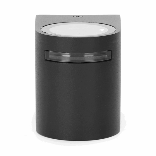 Zwart, minimalistisch draadloos oplaadstation met glazen accent en ronde bovenkant, geschikt voor slimme apparaten. Compact ontwerp voor moderne, stijlvolle oplaadoplossingen.