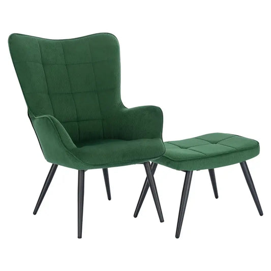 Een crèmekleurige, fluweelachtige fauteuil met zwarte, gestileerde poten en bijpassende voetenbank, beide met knoppen. Ideaal voor een moderne woonkamer of lounge-ruimte.