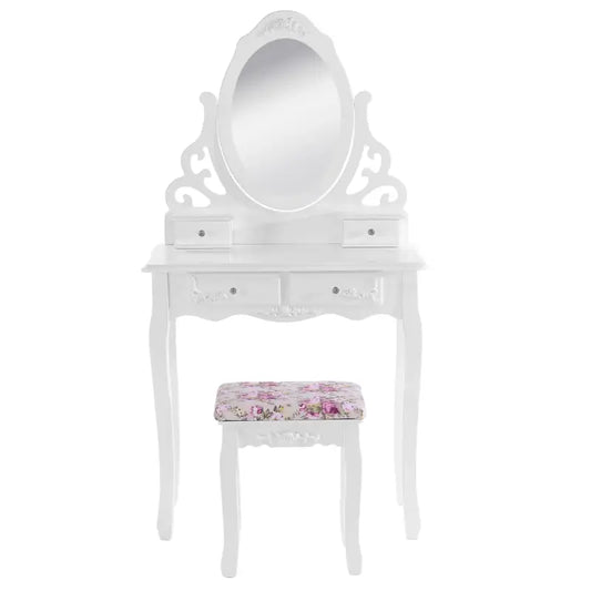 Een witte, klassieke make-up tafel met ovale spiegel en decoratieve details, voorzien van twee laden en een bijpassende kruk met bloemenprint, ideaal voor een romantische slaapkamer of make-up ruimte.