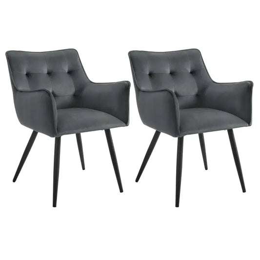 Zwarte, gestoffeerde eetkamerstoelen met witte bekleding en knoppen. Ideaal voor moderne eetkamers of woonkamers met een stijlvolle, minimalistische uitstraling.