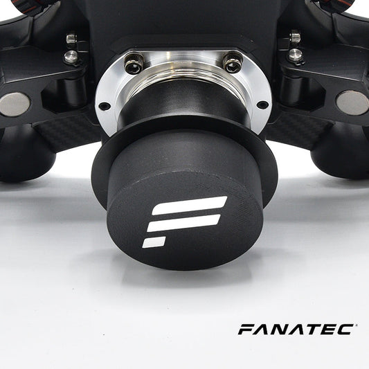 Zwart, textielachtig bedekking met wit F-logo op een Fanatec racestuur. Metalen montagebasis zichtbaar, geschikt voor racestuurinstallaties.