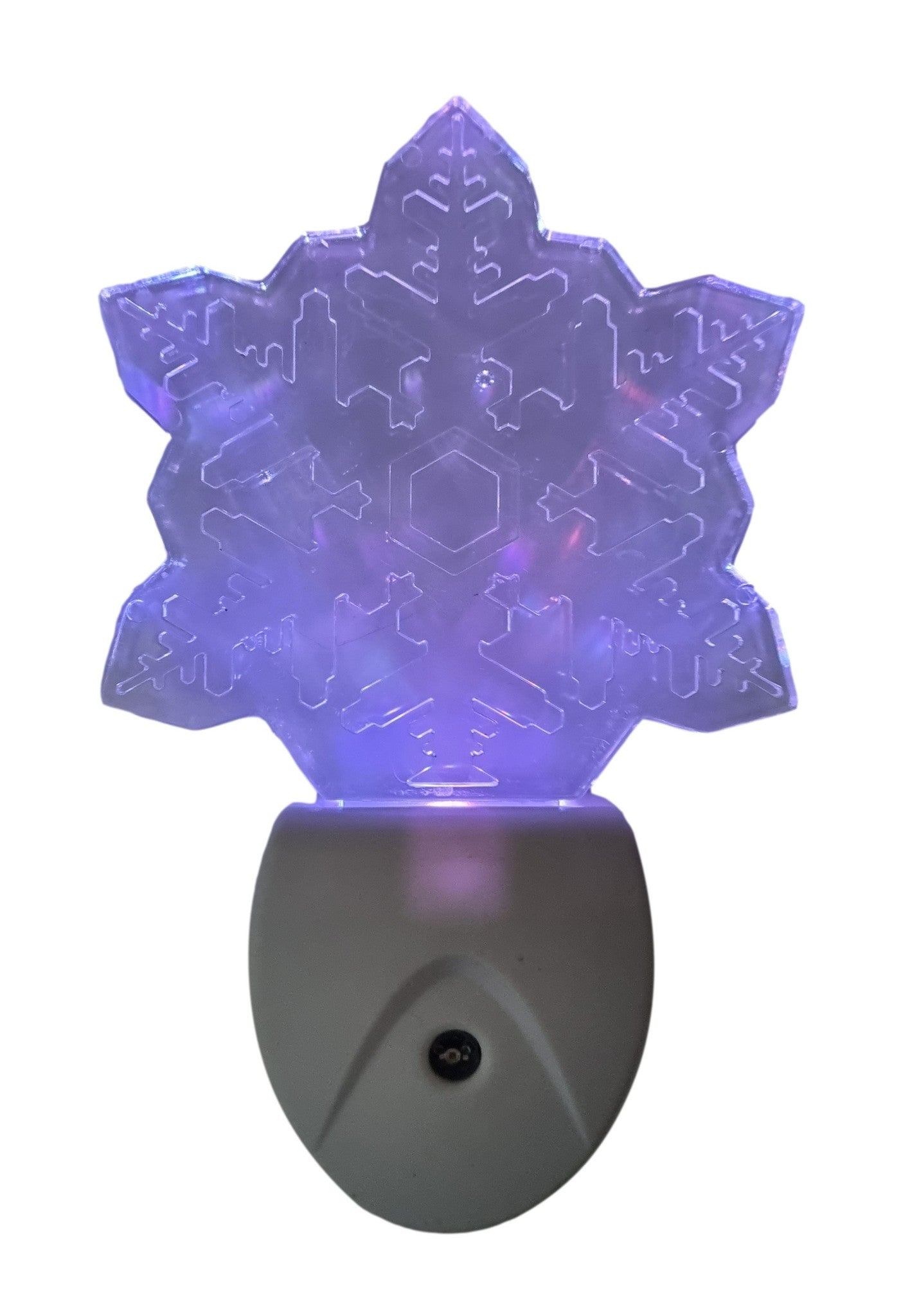 Een witte nachtlamp in de vorm van een sneeuwvlok, gemaakt van transparant kunststof met ingelegde patronen. Perfect voor sfeerverlichting in slaapkamers of als kerstdecoratie.
