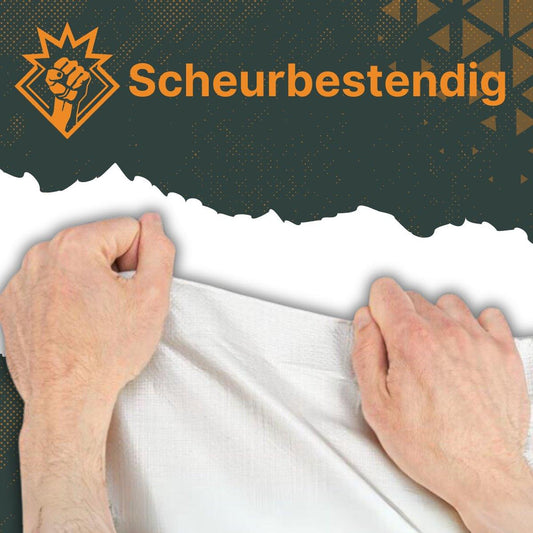 Een witte, ultra-sterk dekzeil van Dekshield, verpakt in transparante folie, geschikt voor het beschermen van tuinmeubilair of zware objecten tegen regen en zon.