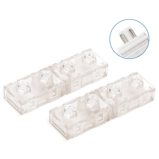 Transparante elektrische aansluitklemmen met zichtbare metalen contactpunten, geschikt voor DIY-projecten en huisinstallaties. Detailopname toont de precisie van de klemconstructie voor veilige stroomverbinding.
