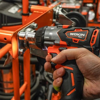 Wokin draadloze impactwrench in oranje en zwart, inclusief twee batterijen, oplader en opbergzak. Ideaal voor professionele schroefwerkzaamheden en thuisprojecten.