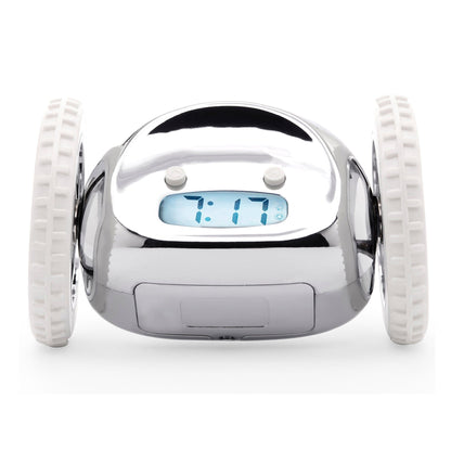 Zilverkleurige robotwekker met witte banden en digitale klok die 7:17 toont, geschikt voor kinderen en jongeren als speelgoed of luchtige wekker in de slaapkamer.