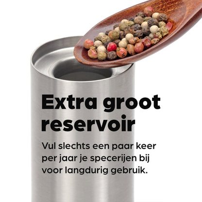 Zilverkleurige Hermanos elektrische pepermolen en zoutmolen met transparante cilinders, gevuld met gemengde peper en roze zout. Ideaal voor moderne keukens en gourmet kookplekken.