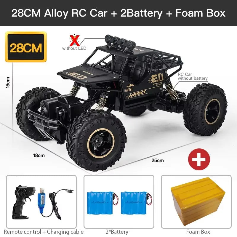 ZWN Rock climber, een zwarte, alloy-upgrade RC-4WD terreinwagen met grote, zichtbare banden en een zender, speciaal ontworpen voor extreme off-road av