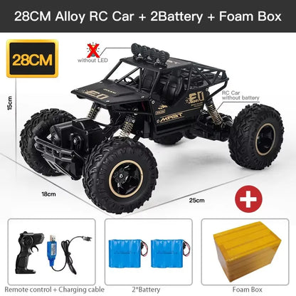 ZWN Rock climber, een zwarte, alloy-upgrade RC-4WD terreinwagen met grote, zichtbare banden en een zender, speciaal ontworpen voor extreme off-road av