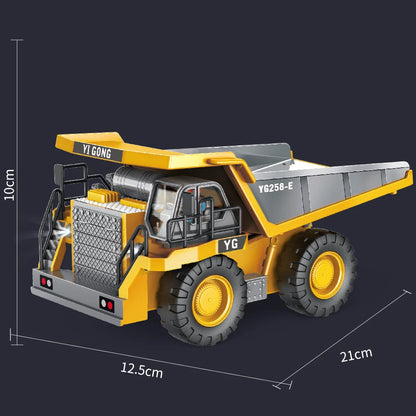 Grote gele RC-graafmachines met zwarte details en realistische trekker, graafmachine en bulldozer op zand, bediend via een oranje afstandsbediening vo