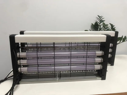 60W insectenverdeling met blauwe UV-lampen, witte en zwarte frame, 65cm breed en 25,5cm hoog, geschikt voor binnenruimtes en commerciële ruimtes. - Fo