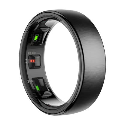 Zilverkleurige slimme ring met glanzende binnenkant en zichtbare LED-indicatoren, naast een goudkleurige variant op een draadloze oplader voor gezondheidsmonitoren. - Foto 8