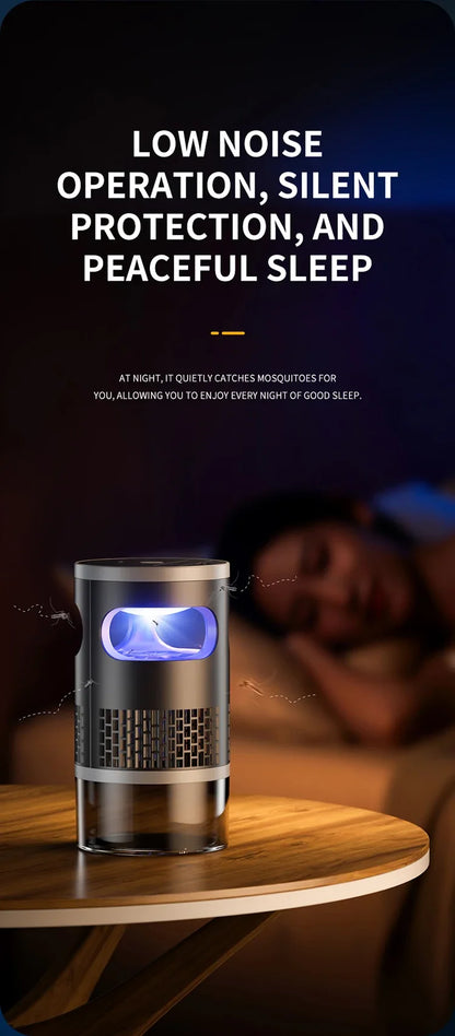 Lenovo Mosquito Killer met paarse lichtgolf, zichtbaar in zwart metaal en glas, op houten tafel. Geschikt voor slaapruimtes en kinderkamers, met lucht
