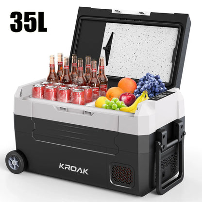 Zwarte, wielerige Hcalory koelbox met 35L capaciteit, gevuld met frisse dranken en fruit, inclusief smartphone-app voor temperatuurcontrole, ideaal vo