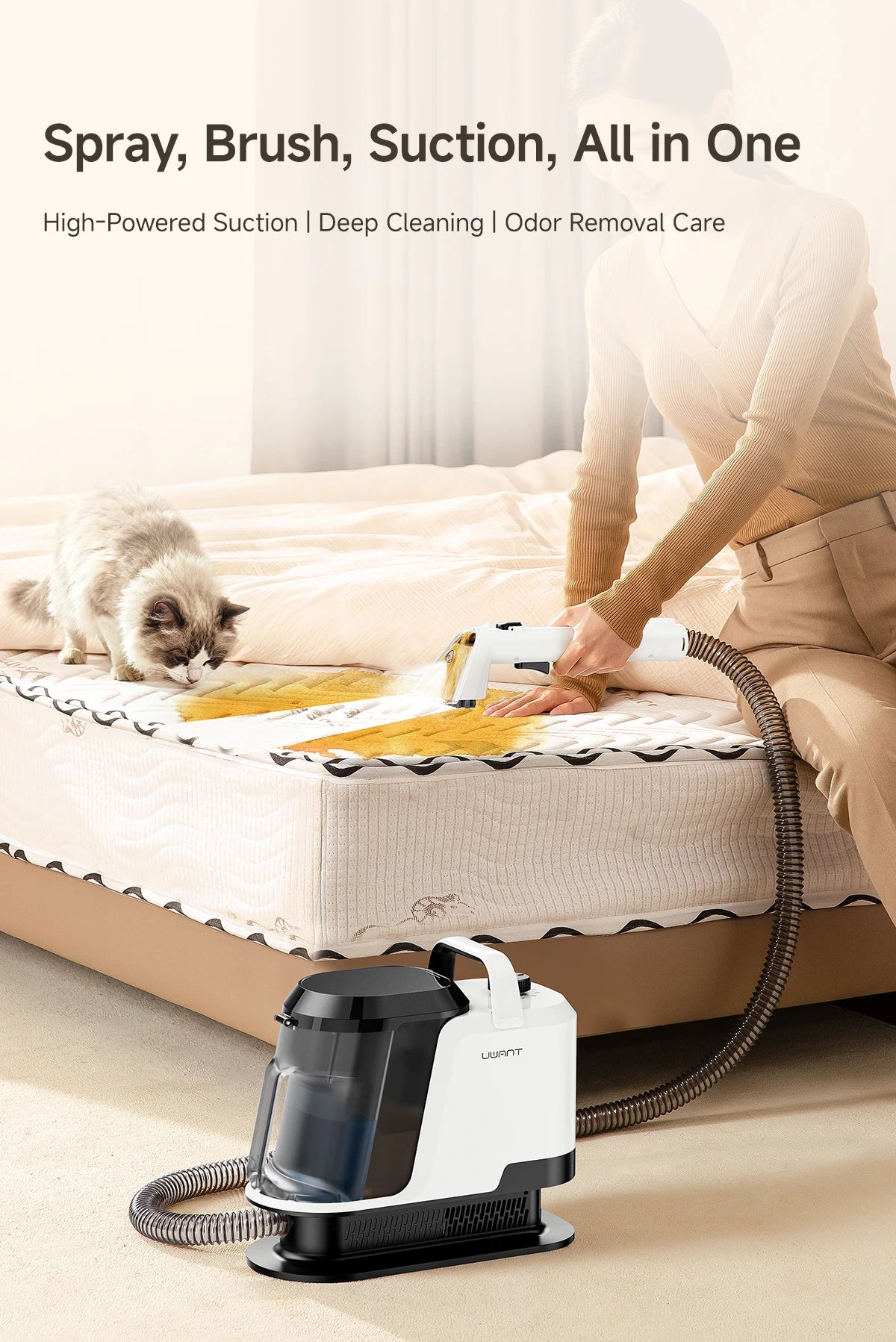 De Uwant Y100 stofzuiger met spray- en borstelkop is wit met transparante behuizing en een 1,2L waterreservoir, speciaal ontworpen voor intensieve sch