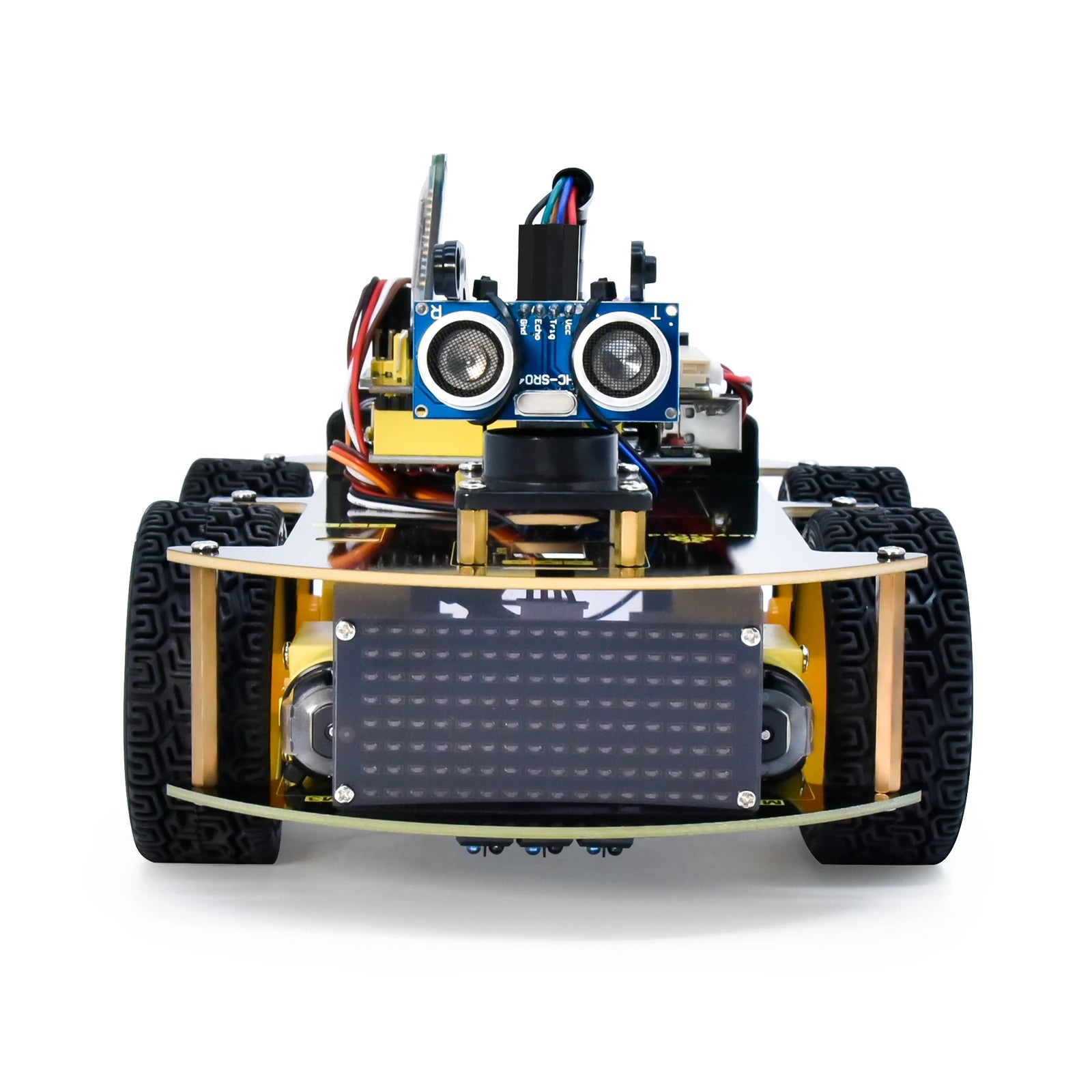 Een Keyestudio robotkit met zwarte chassis, gele wielen en diverse elektronische componenten, inclusief sensoren en een microcontroller, voor educatie