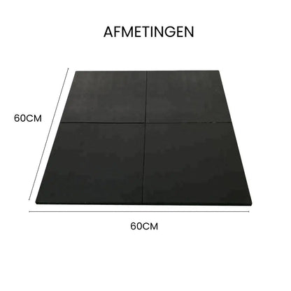 Zwart rubberen vloermat in vier stukken, geschikt voor wasmachineondersteuning. Geïntegreerd met een wasmachine voor stabiliteit en bescherming van de vloer.