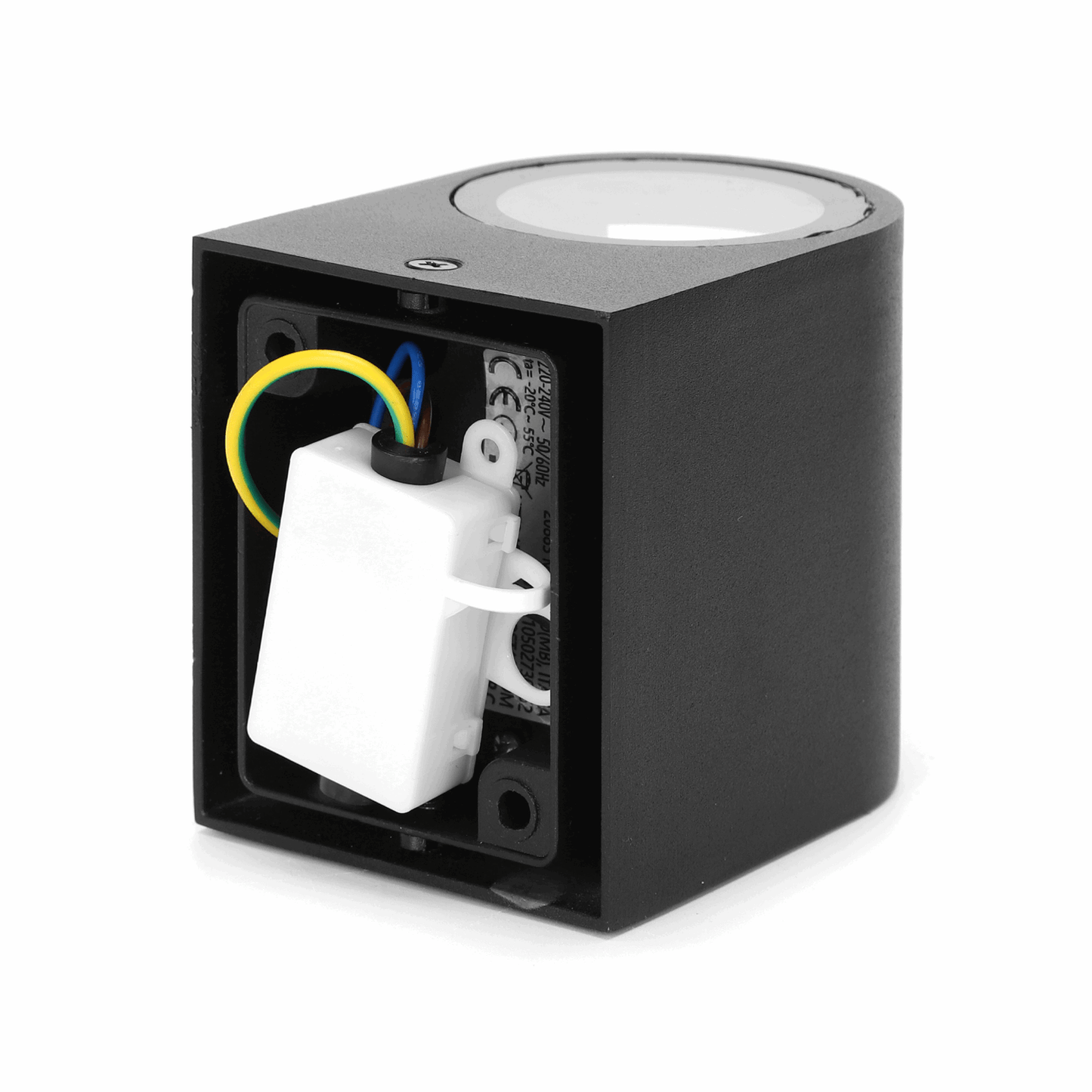 Zwart, minimalistisch draadloos oplaadstation met glazen accent en ronde lichtopening, geschikt voor slimme apparaten en mobiele telefoons. Compact ontwerp voor moderne, stijlvolle oplaadoplossingen.