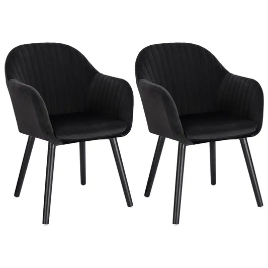 Blauwe fluwelen fauteuils met gestoffeerde armleuningen en zwarte metalen poten, geschikt voor moderne woonkamer of eetkamer. Luxueuze zitcomfort voor dagelijks gebruik of bij speciale gelegenheden.