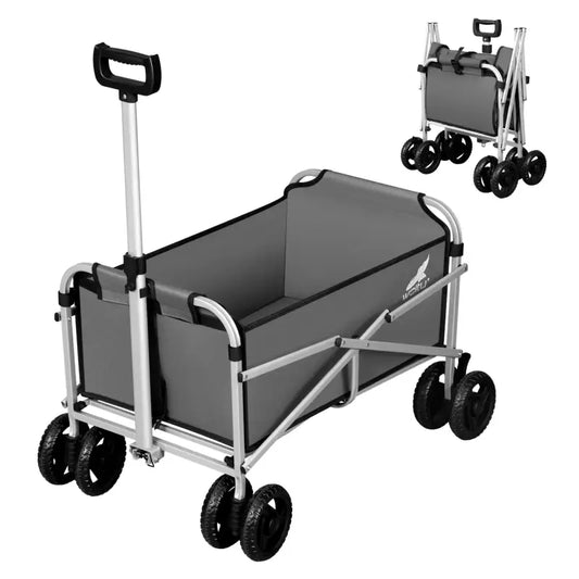 Grijze vouwkar met aluminium frame en zwarte rubberen wielen, geschikt voor zowel kamperen als tuinwerk. Compact opgevouwen model zichtbaar in de achtergrond.