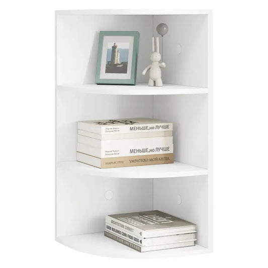Wit hoekboekenkast met drie planken, gevuld met boeken en decoratieve accessoires zoals een fotolijst en een konijntje, ideaal voor kleine ruimtes of als opbergoplossing in een woonkamer.