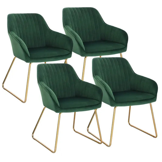 Blauwe fluwelen eetkamerstoelen met goudkleurige metalen poten, geschikt voor moderne interieurs. Set van vier, met gestoffeerde rugleuningen en armleuningen voor comfort.