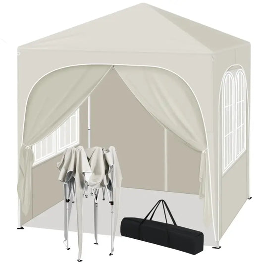 Een beige opvouwbare tuin tent met witte kozijnen en opgevouwen zijwanden, inclusief een zwarte draagtas voor opslag. Ideaal voor buitenfeesten en zonbescherming.
