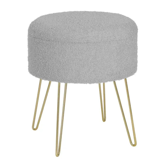 Grijze, fluweelachtige kussenschoen met goudkleurige harenbenen, ideaal als decoratieve zitplaats in een moderne woonkamer of als opbergstoel voor kleine ruimtes.