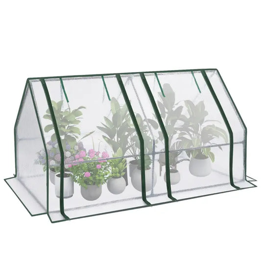 Groene metalen kast met transparante plastic wanden, gevuld met diverse potten planten, inclusief bloeiende hydrangea’s. Ideaal voor binnen- en buitenkweek van bloemen en groene planten.
