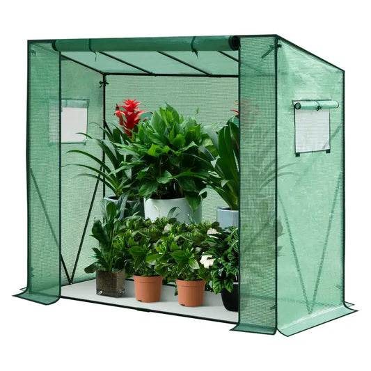 Groene opvouwbare tuinstructuur met meshwand en transparante dakpanelen, voorzien van roll-up ramen. Ideaal voor tuinbouw en plantbescherming tegen insecten en wind.