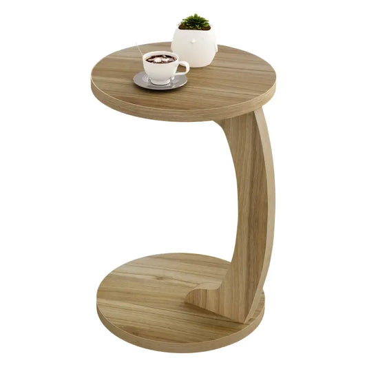 Een moderne, lichtgekleurde houten bijzettafel met een elegante, gebogen ondersteuning en ronde blad. Geschikt als bijzettafel voor woonkamer of slaapkamer, met een natuurlijk houten oppervlak.