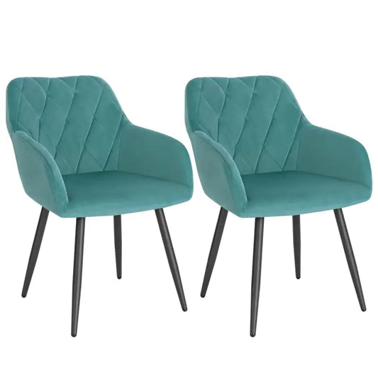 Twee moderne, turkoois fluweelstoelen met gestikte rug en zwarte metalen poten, ideaal voor een stijlvolle eetkamer of woonkamer. Comfortabele zitvlakken met een retro-look voor dagelijks gebruik.
