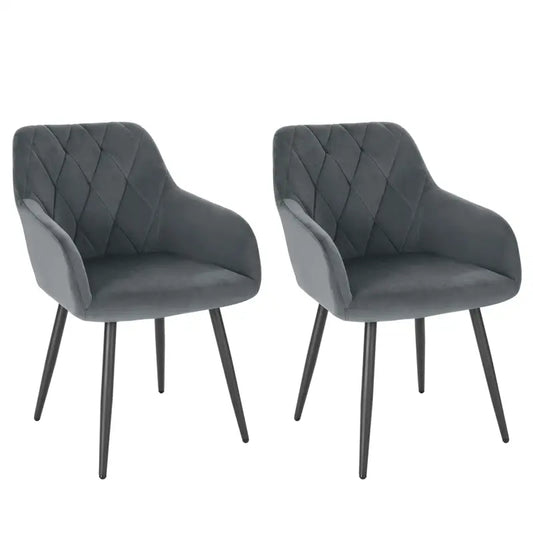 Turquoise fluweelstoelen met gestikt patroon en zwarte metalen poten, ideaal voor moderne eetkamer of woonkamer. Stijlvolle set van twee, geschikt voor comfortabele zithoeken.