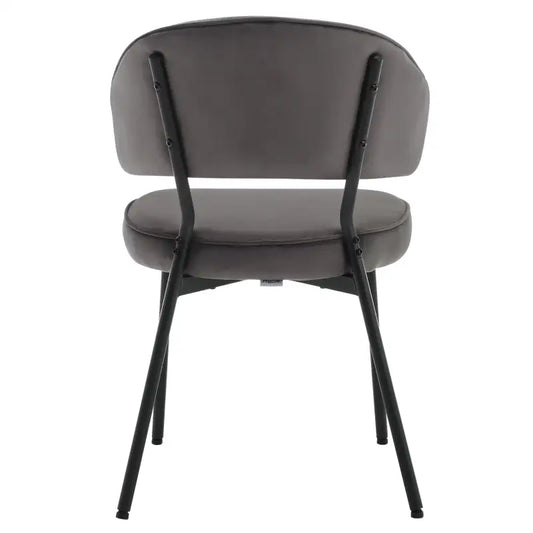 Grijze fluweelstoelen met zwart metalen frame, perfect voor moderne eetkamer of woonkamer. Comfortabele zitting en rugleuning, ideaal voor dagelijks gebruik en stijlvolle interieurs.