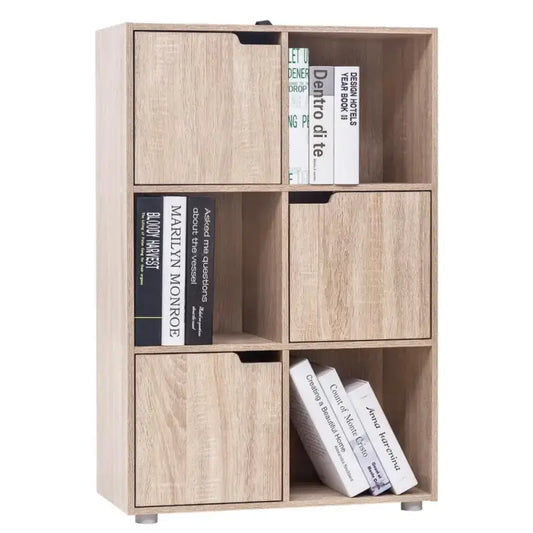 Een licht houten boekenkast met drie vakken en drie opbergvakken, gevuld met boeken. Ideaal voor moderne woonkamer of kantoorruimte, met een minimalistisch design en zichtbare boeken.
