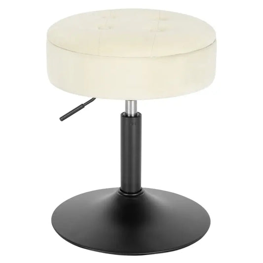 Een crèmekleurige, gepolsterde hoge kruk met knoppen en een zwarte metalen voetstuk, geschikt voor make-up of kapperstoel.