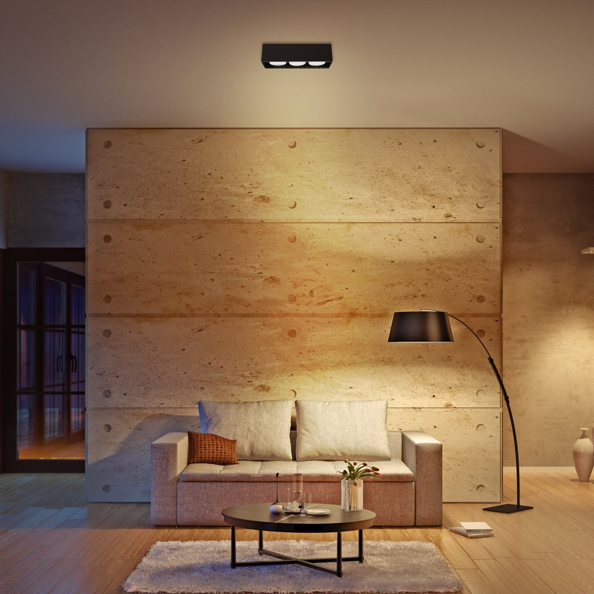 Zwart, rechthoekig LED-plafondlampenpaneel met drie witte GX53 lampen, naast de verpakking. Ideaal voor moderne badkamers of kantoren met minimalistische verlichting.