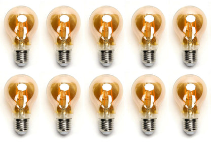 Zes glazen filamentlampen met warm wit licht en zichtbare koperen draden, geplaatst op een witte achtergrond. Perfect voor vintage interieurstijl of sfeerverlichting in woon- en werkomgevingen.