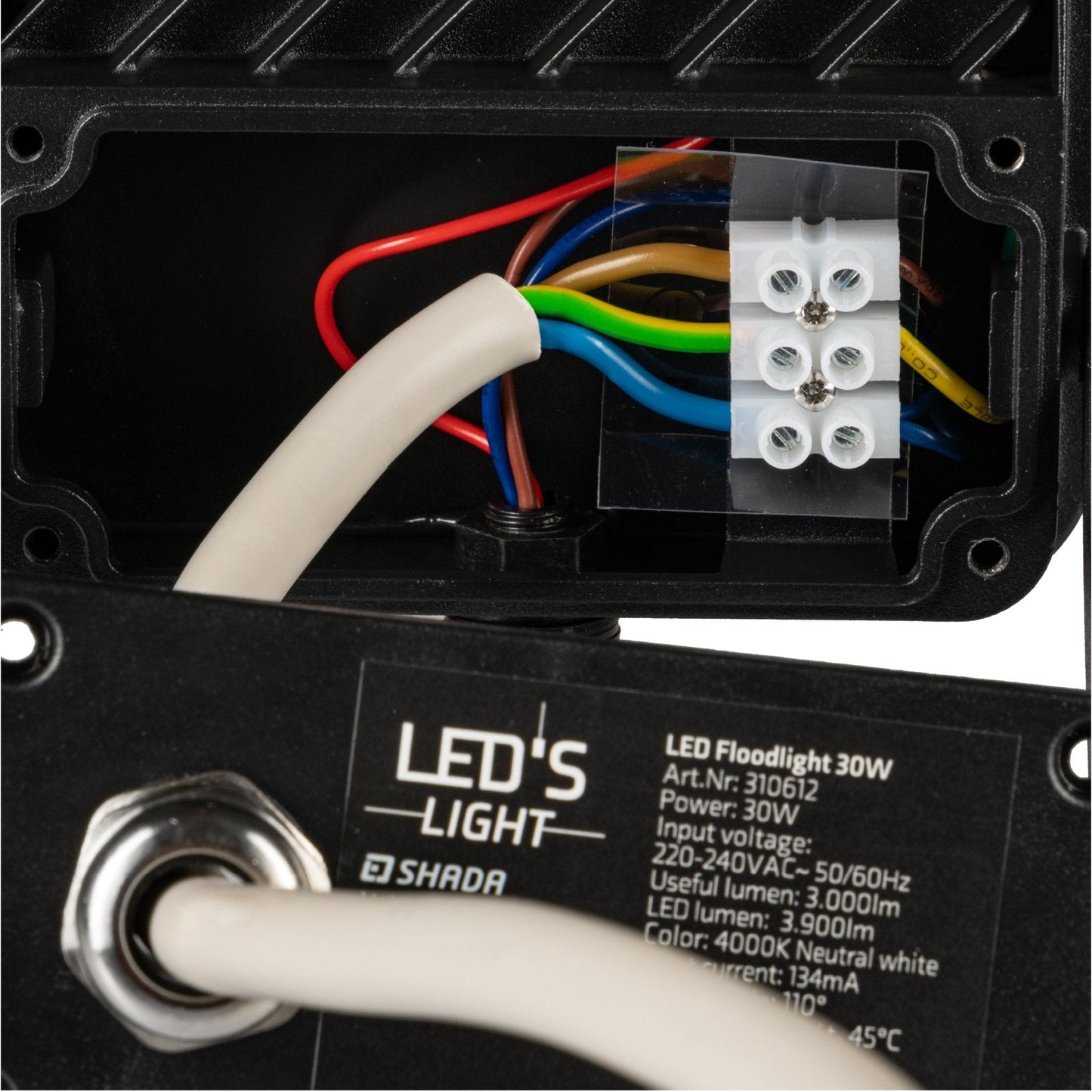 Zwart LED-stralingslicht met bewegingssensor, voor buitenverlichting. Het apparaat heeft een glanzende afwerking en een zichtbare sensor voor automatische verlichting bij beweging.