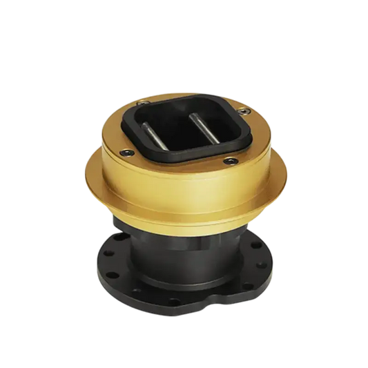 Gouden metaalcomponent met zwart plastic deksel en zichtbare schroefmontage, geschikt voor industriële toepassingen. Compacte constructie met flens voor montage in machines of automatiseringssystemen.