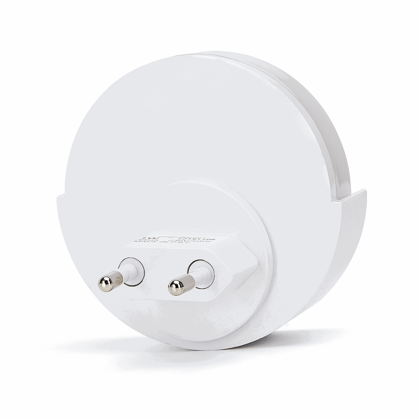 Een witte, ronde LED-lamp met een gladde, mat afwerking en een zichtbare stekker. Geschikt voor moderne interieurs en als nachtlampje in slaapkamers.