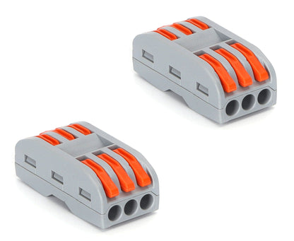 Grijze kabelverbindingen met oranje schuifklemmen, geschikt voor elektrische installaties. Zichtbare metalen contactpunten en robuuste plastic constructie voor veilige stroomverbindingen.