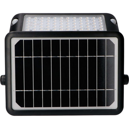 Zwarte zonne-LED wandlamp met helder verlichte panelen, gemonteerd op een bakstenen muur. Ideaal voor buitenverlichting en tuinverlichting, met zichtbare zonnecellen en schakelaars.