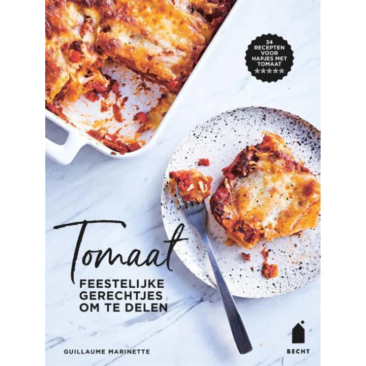 Zwart gietijzeren bakvorm met handgrepen, voorzien van een glanzende, anti-kleef coating. Perfect voor het bakken van tomatenbouillon of andere feestelijke gerechten.
