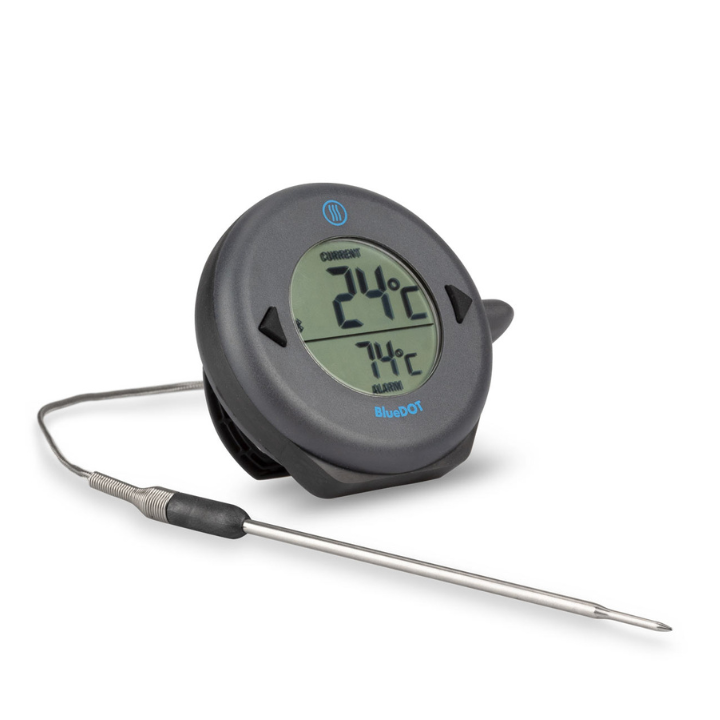 Zwart ronde BlueDOT thermometer met digitale display, toont huidige temperatuur 76°F en alarm 165°F. Bluetooth-icoon en bedieningsknoppen zichtbaar voor gebruik bij kookapparatuur.