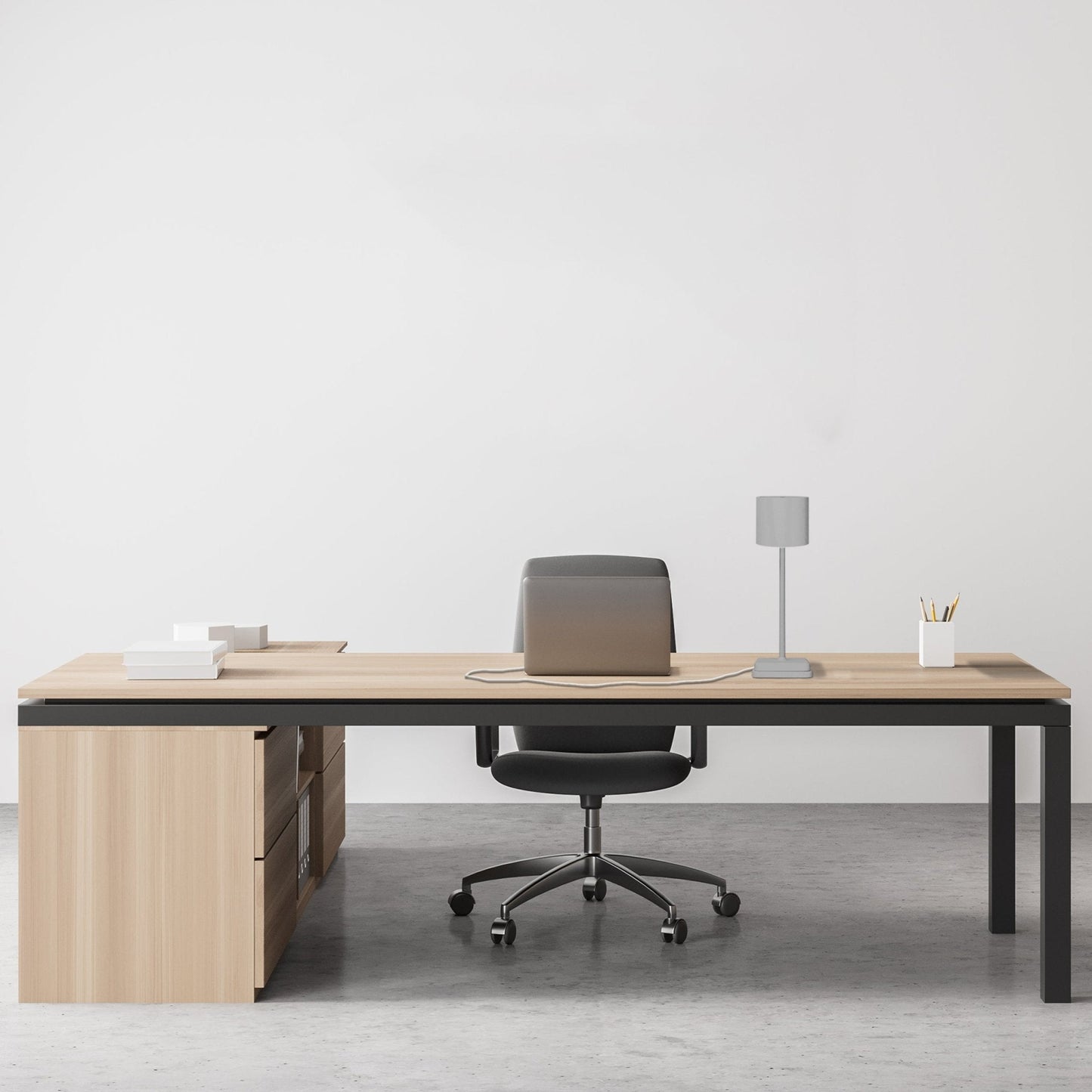 Een minimalistische grijze tafellamp met cilindrisch scherm en gestileerde voet, geschikt voor moderne slaapkamer- of woonruimteverlichting. Geïnspireerd op Scandinavische designstijl voor rustige sfeer.